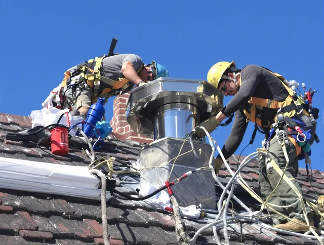 Protective chimney cap installed by Riverside Chimney Sweep in Riverside, CA